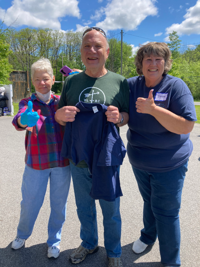 SCRUFF members pose with Jeff who was presented with a SCRUFF shirt during the May 2024 Spay Day